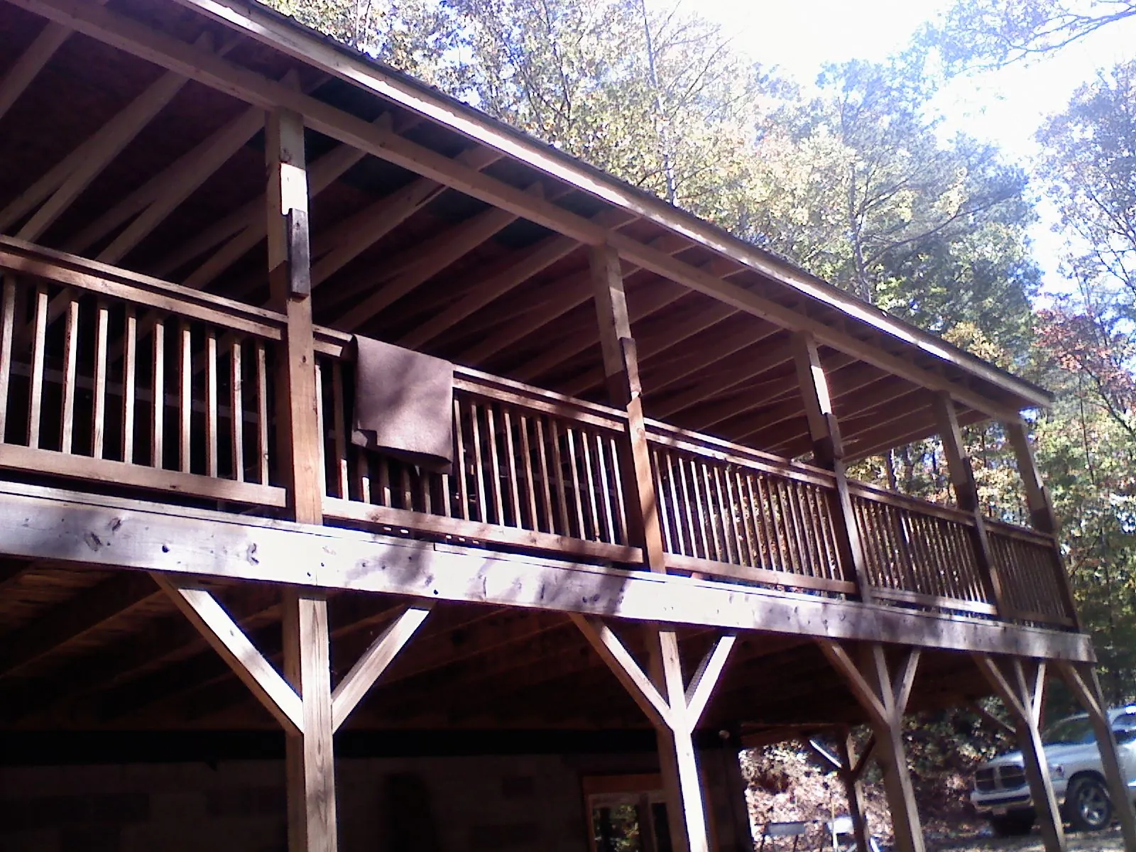 Timber framing under a new elevated porch and deck — Roof Leak Repair in Orland Park by Roofing Brothers